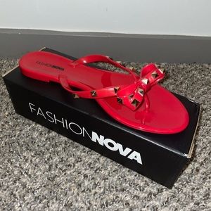 Red and black flat sandals from fashion nova